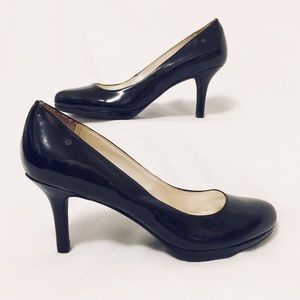 Etienne Aigner black patent leather roundtoe pumps